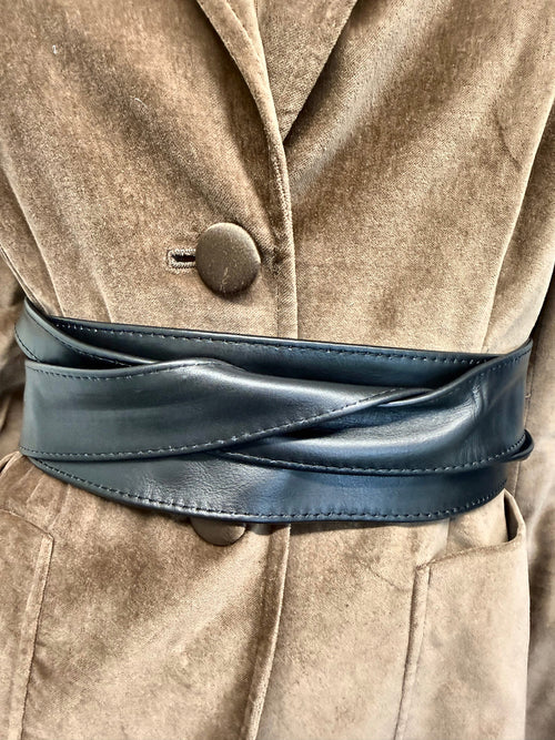 Black real leather wide obi sash belt wrapped over a camel velvet blazer