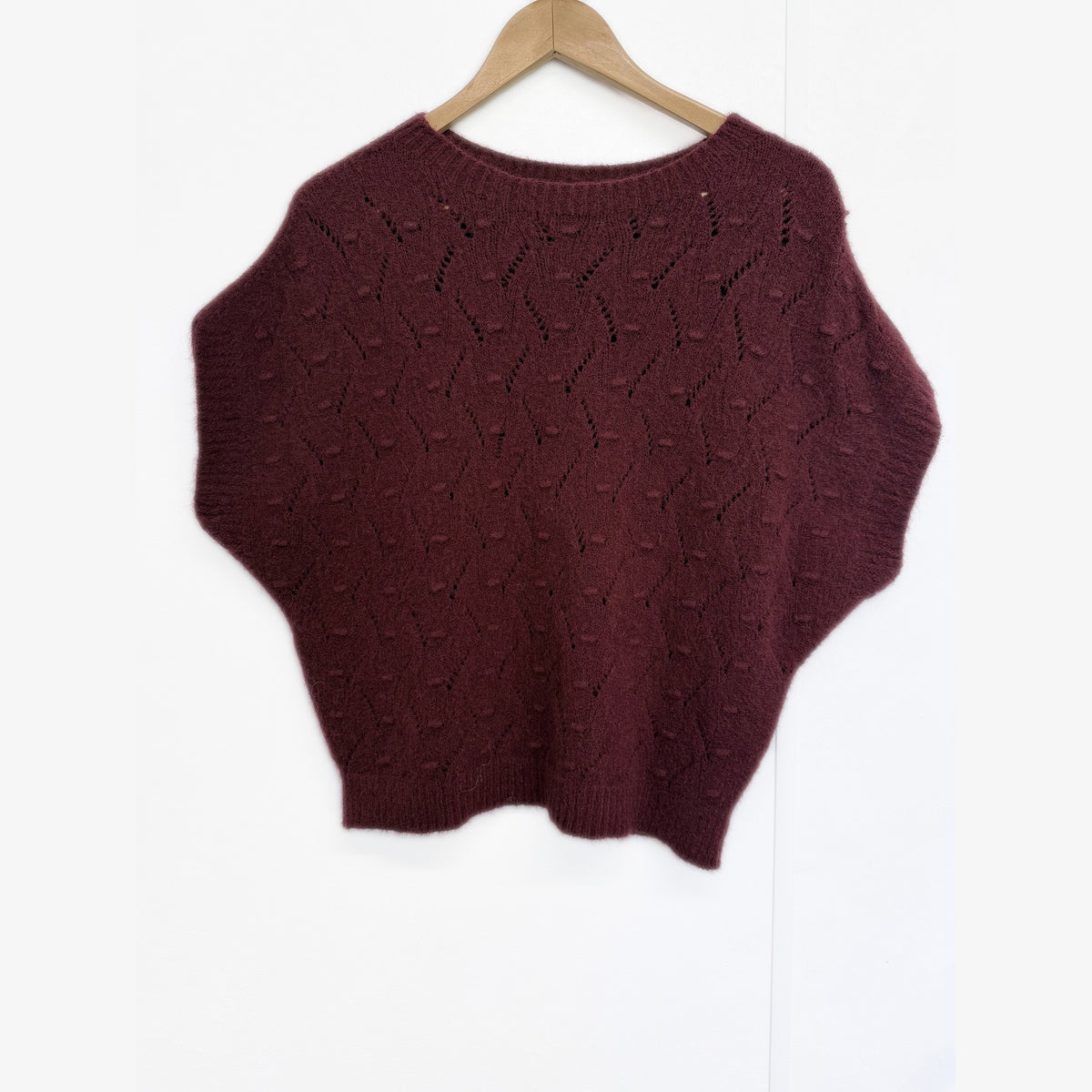 Burgundy soft bobble pointelle knit tank top on hanger, front