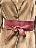 Burgundy real leather wide obi sash belt tied over a camel velvet blazer