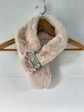 Cream ivory faux fur neck warmer scarf with pearl loop brooch on a hanger