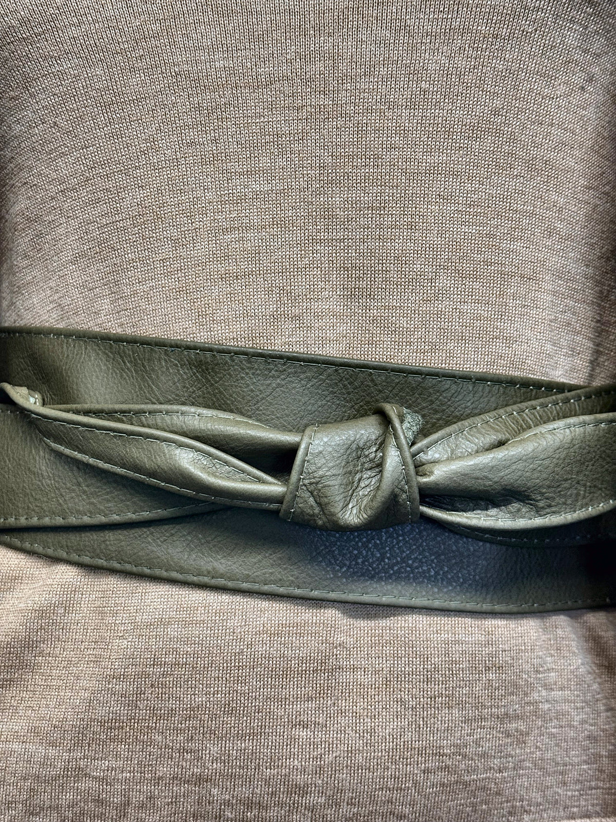 Olive Khaki Green leather obi belt tied over a grey knit jumper