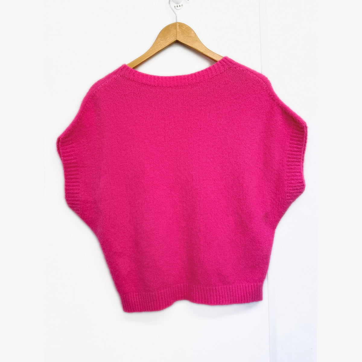 Hot Pink knit tank top on hanger, back